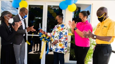 The Minister of Culture, Gender, Entertainment and Sport, the Honourable Olivia Grange, cuts the ribbon to open the Women&#039;s Centre of Jamaica Foundation&#039;s new centre in Santa Cruz, St Elizabeth on Thursday, 30 September 2021. Sharing the moment are (l-r) Executive Director of the Women&#039;s Centre, Dr Zoe Simpson; Member of Parliament for Northeast St Elizabeth, Delroy Slowley; Chair of the Women&#039;s Centre Board, Debbie Salmon; Permanent Secretary in the Ministry of Culture, Gender, Entertainment and Sport, Denzil Thorpe.