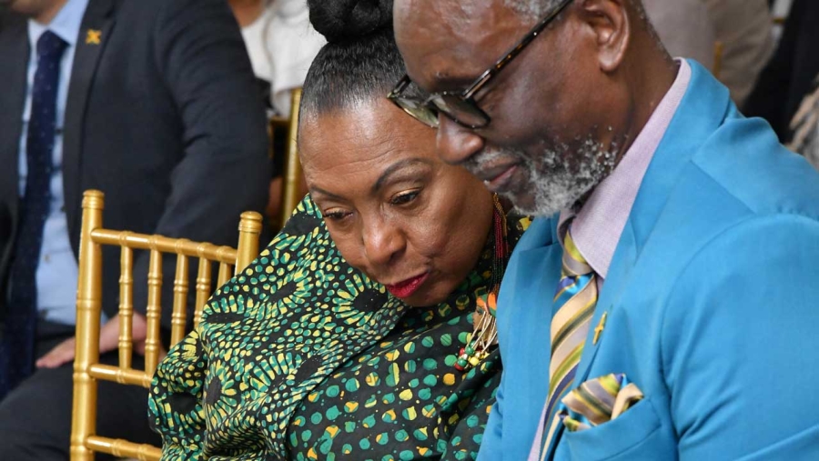 The Minister of Culture, Gender, Entertainment and Sport, the Honourable Olivia Grange and the Minister of Local Government and Rural Development, the Honourable Desmond McKenzie confer at the Media Launch of Labour Day 2023