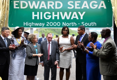 The Most Honourable Edward Seaga (fourth left) is being applauded by his wife, the Most Honourable Carla Seaga (third left); the Most Honourable Andrew Holness, Prime Minister (third right) and Mrs Holness, the Honourable Olivia Grange, Minister of Culture, Gender, Entertainment and Sport; the Honourable Desmond McKenzie, Minister of Local Government and Community Development (left to right); His Excellency, Tian Qi, Ambassador of the People’s Republic of China to Jamaica (left) and the Honourable Norma Walters, Custos Rotulorum for the Parish of St. Ann (second left). Occasion was the renaming of the North-South leg of Highway 2000 to the Edward Seaga Highway on Tuesday, June 12, 2018 at the Unity Valley Toll Plaza, St. Ann.