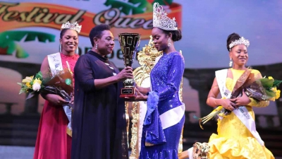 The Minister of Culture, Gender, Entertainment and Sport, the Honourable Olivia Grange, presents winning trophy to Miss Jamaica Festival Queen 2019, Khamara Wright. Also pictured are 1st Runner Up AnnaKay Hudson (left) and 2nd Runner Up Chardonnae Parkins.